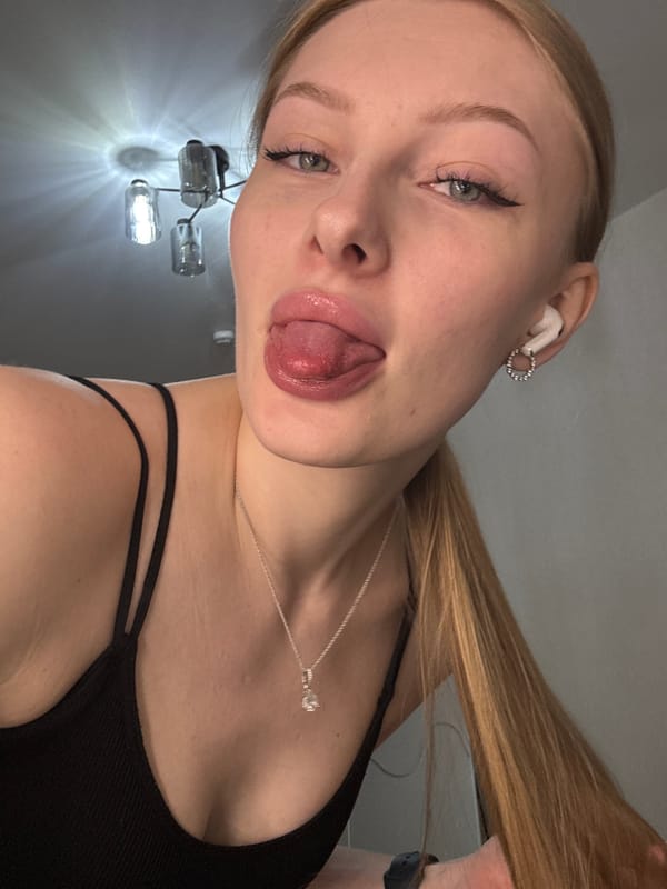 Woman takes playful selfies in Perm apartment