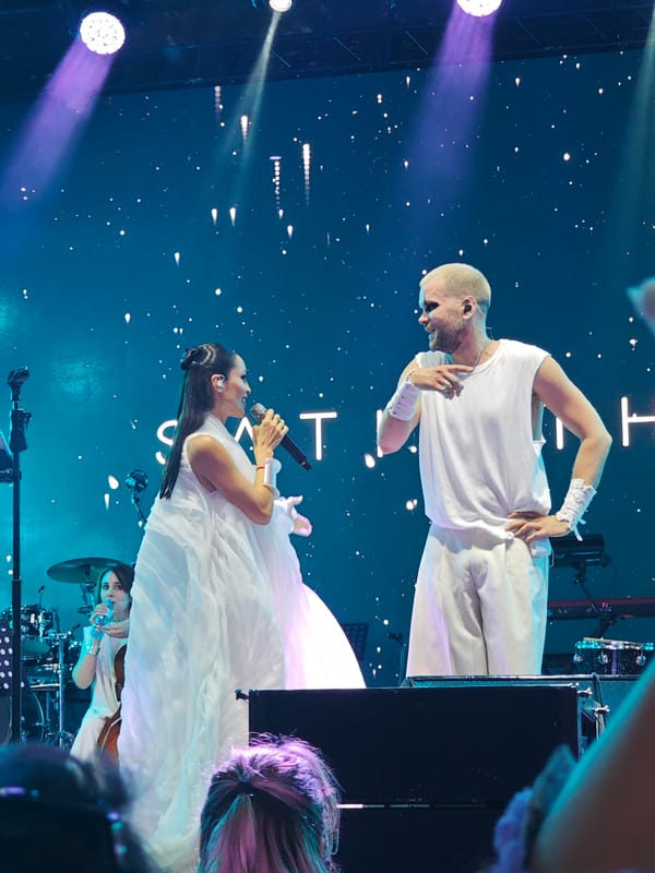Live outdoor performance in Saint Petersburg, white gown center stage