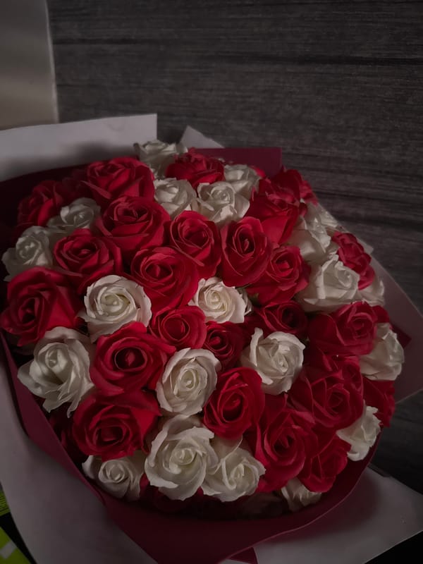 Beauty products and floral arrangements documented in evening session