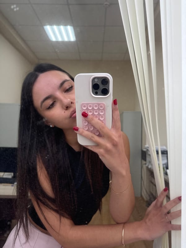 Mirror selfie, food container, and a duckling plate