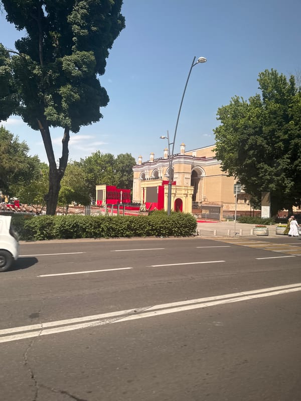 Street scenes documented in Tashkent showing vehicles and architecture