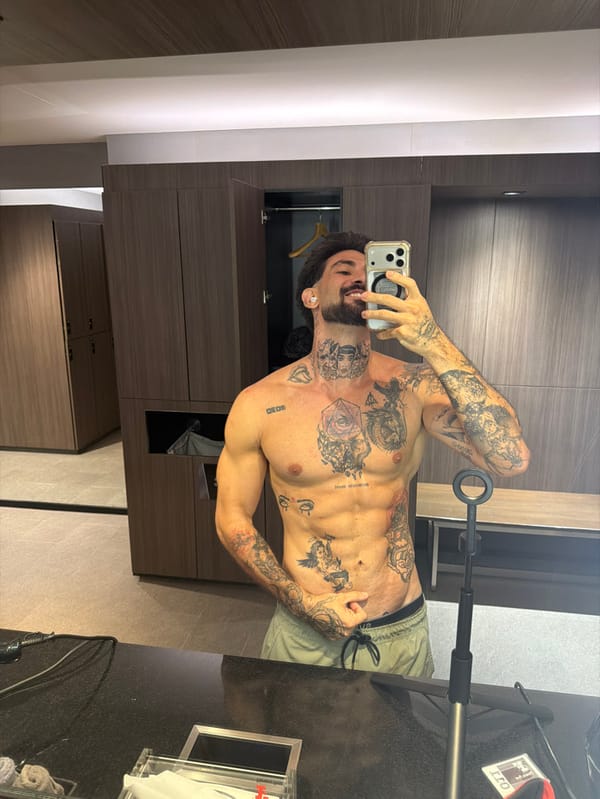 Tattooed man takes multiple mirror selfies in Bangkok facilities
