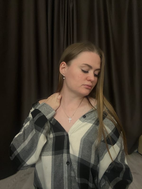 Woman photographed in multiple indoor poses in Sevastopol