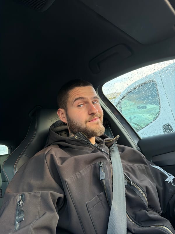 Man observed in car during early morning rain in Sofia