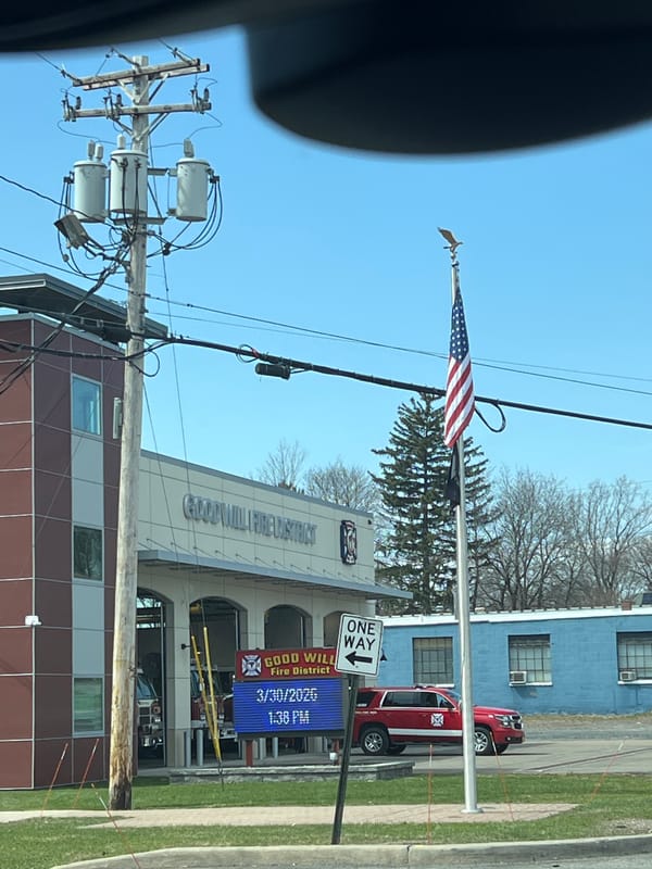 Fire station documented in Newburgh with flag display