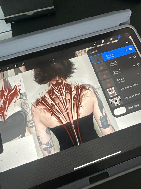 Digital artist works on tattoo-themed artwork in Lyubertsy