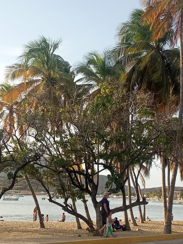 Sunset moments captured across Juan Griego beach and harbor