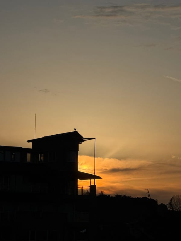 Sunset silhouettes building in Tsarevo, Bulgaria