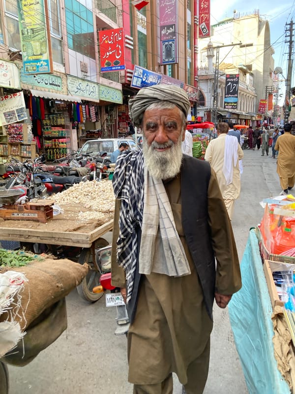 Street scene photographed in Quetta shows man in traditional dress