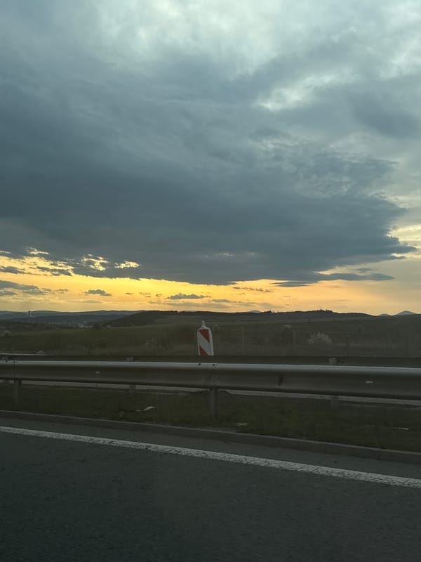 Vehicle travels highway through Pernik, Bulgaria