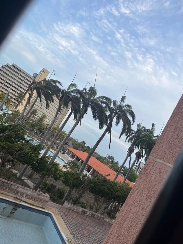 Resort stay documented in Porlamar, Venezuela with pool views
