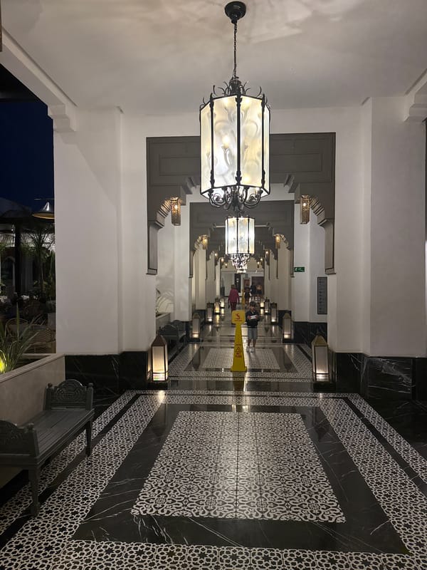 Interior corridor with white archways documented in Agadir, Morocco