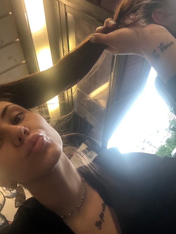 Woman takes selfie on public transport in Sofia