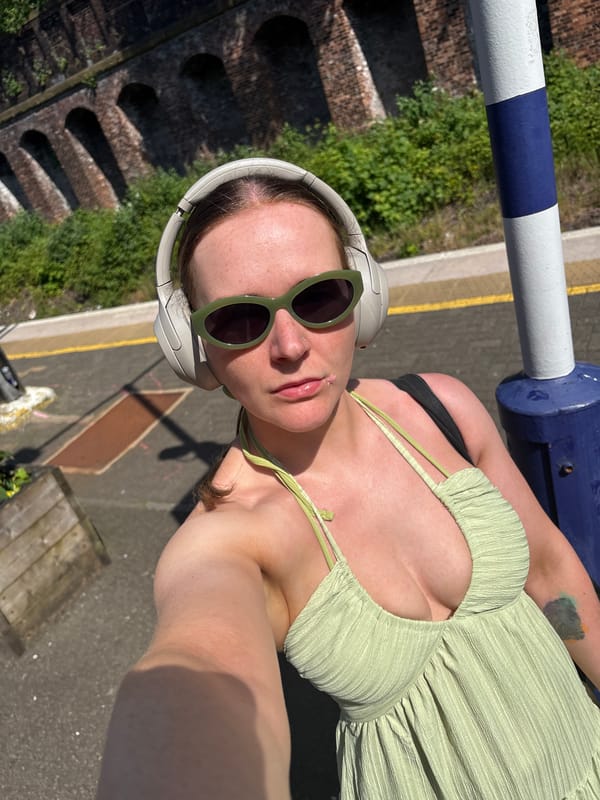 Woman takes selfie on railway bridge in Glasgow
