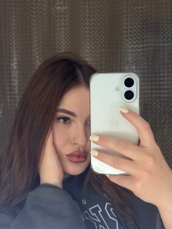 Woman takes selfie with iPhone in Krasnodar, Russia