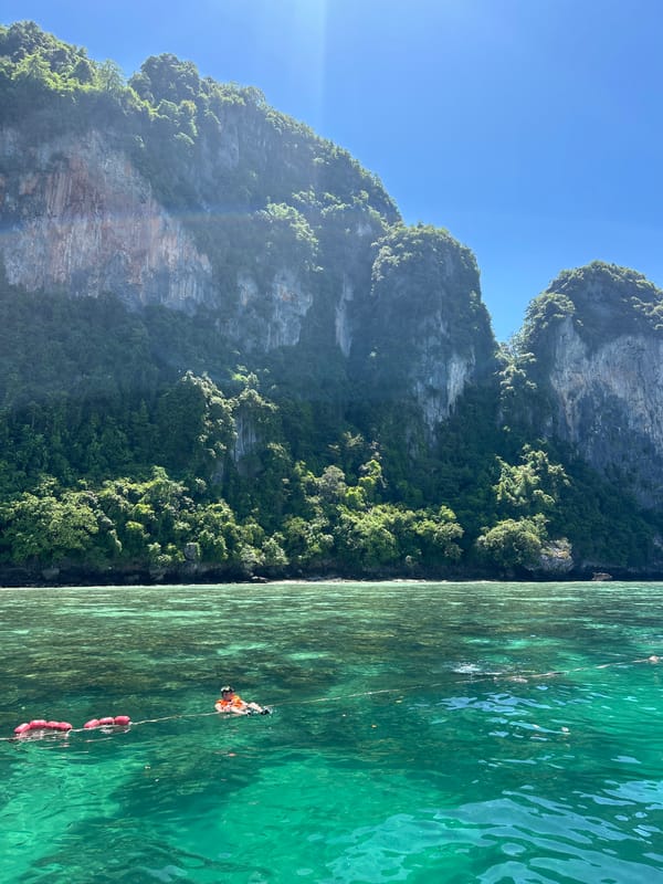 Snorkeler enjoys morning swim in Ao Nang's turquoise waters