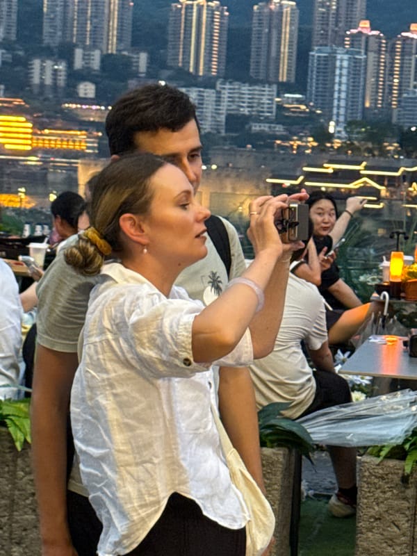 Chongqing's Yangtze riverfront glows on a summer evening