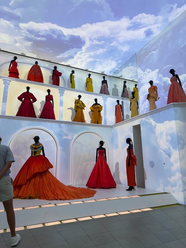 Inside a Paris haute couture exhibition showcasing historical fashion and design