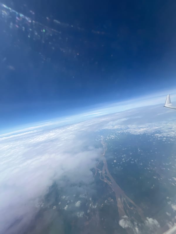 Aerial view captured over Usogba, Nigeria from aircraft window