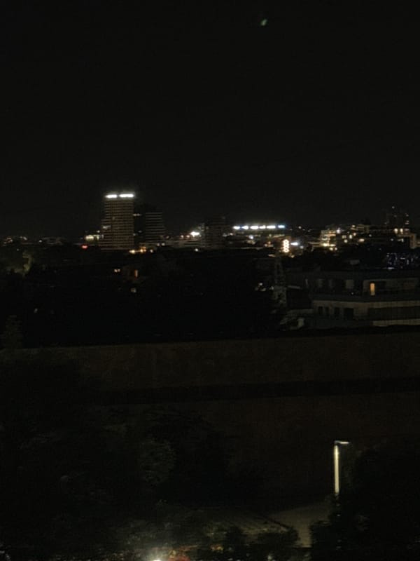 Evening lights illuminate Sofia cityscape on May 27