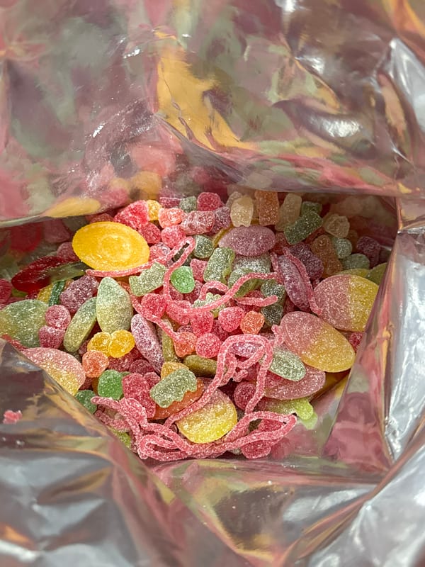 Multicolored gummy candies observed in silver package, Zhiten Bulgaria