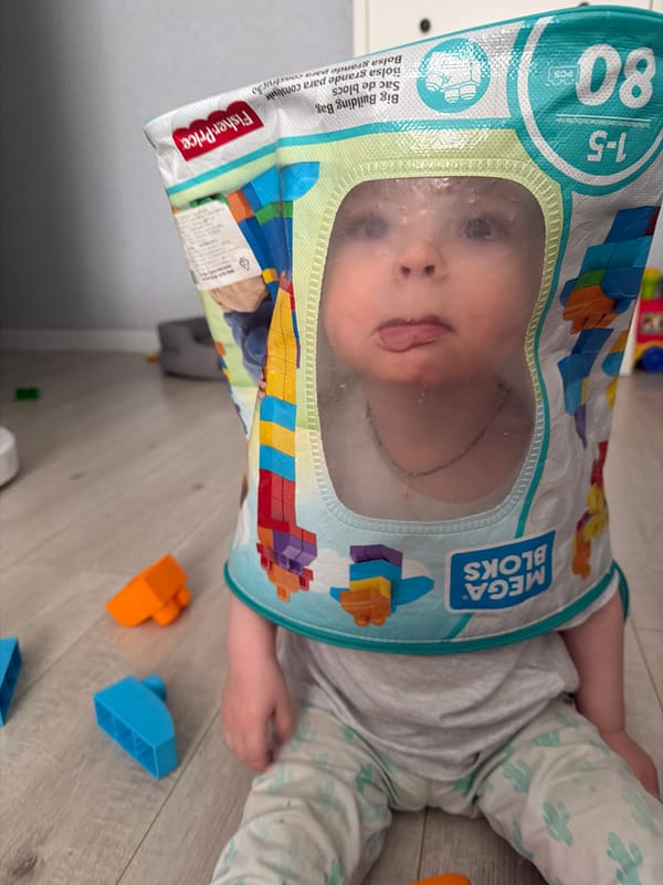 Woman and playful dog share quiet morning moment in Votkinsk