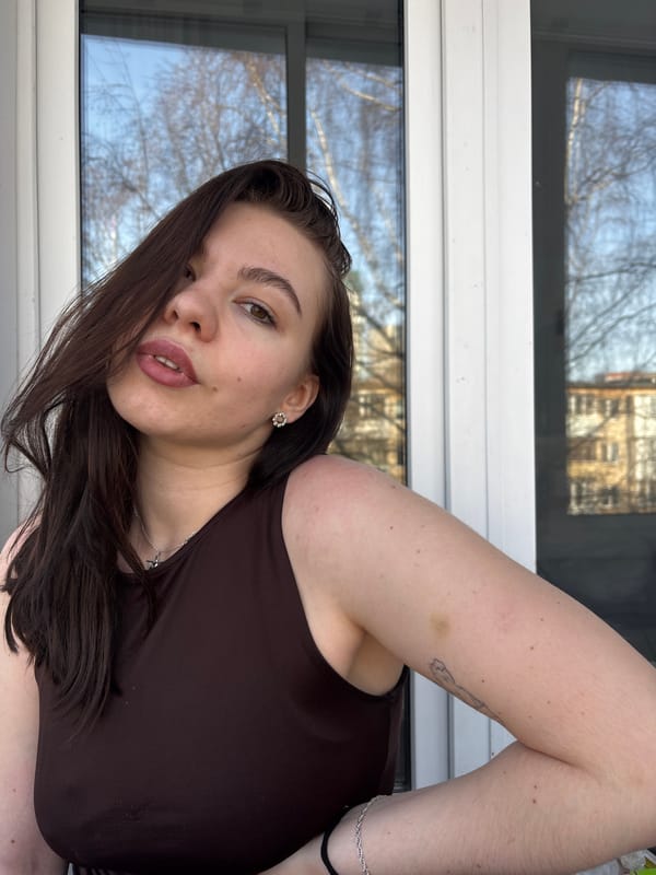 Woman photographed indoors in Perm, Russia