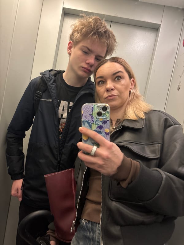 Two people take selfie in elevator in Vsevolozhsk
