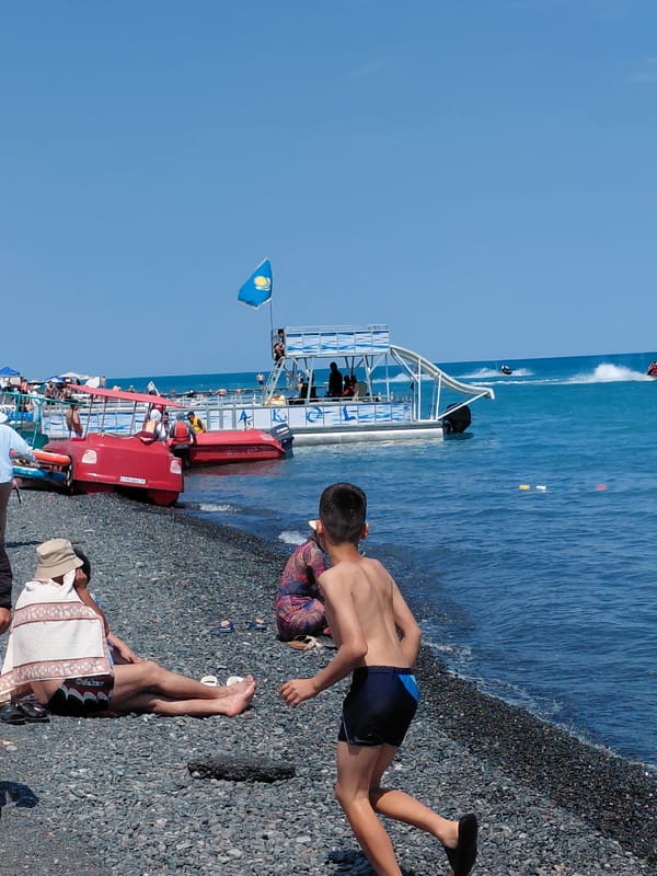 A lazy summer day on Lake Balkhash's pebble shore