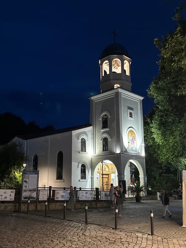 Nighttime stroll through a European town's historic streets and churches