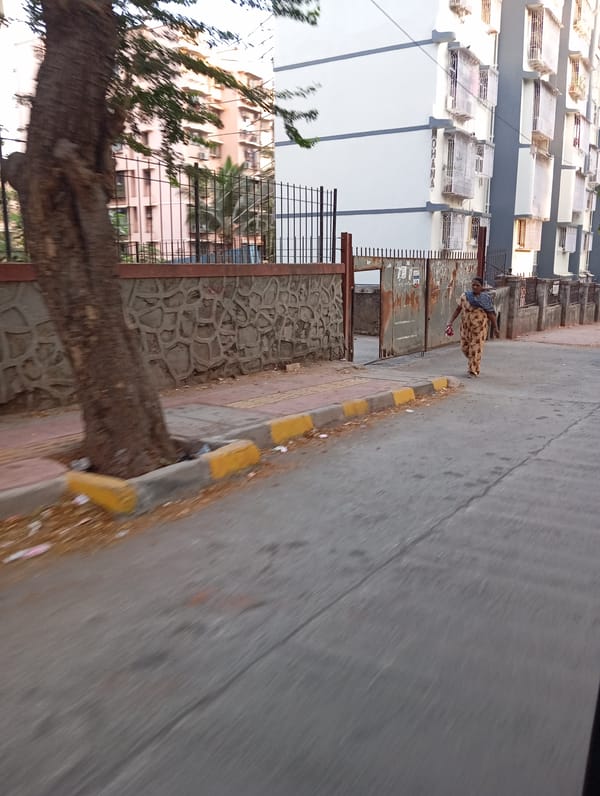 Everyday street life captured in Mumbai during midday hours