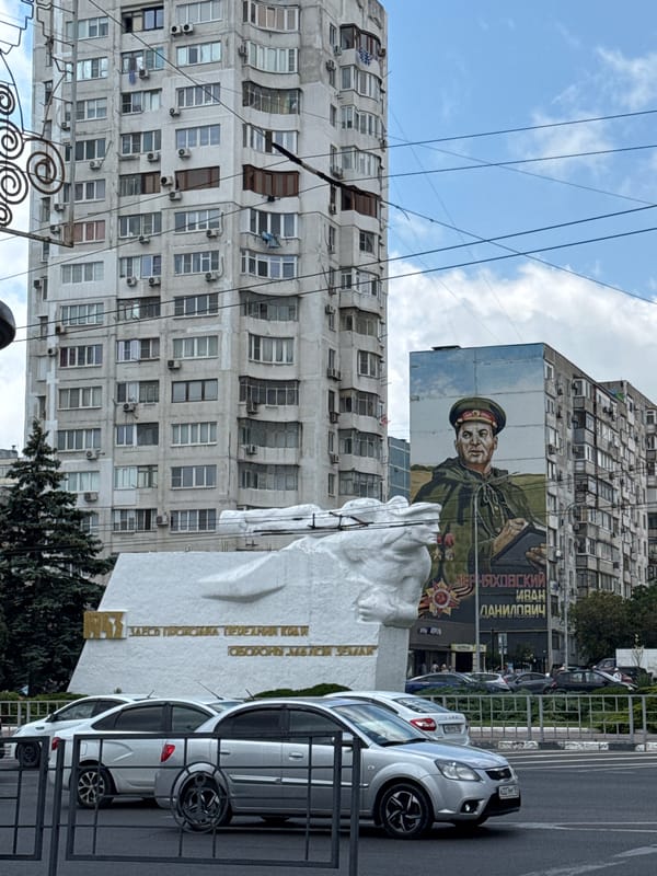 Novorossiysk city center: fountains, pigeons, and street murals