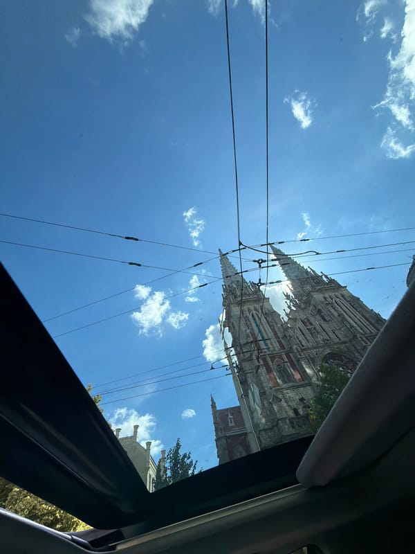 Driving through central Kyiv past the Catholic Cathedral