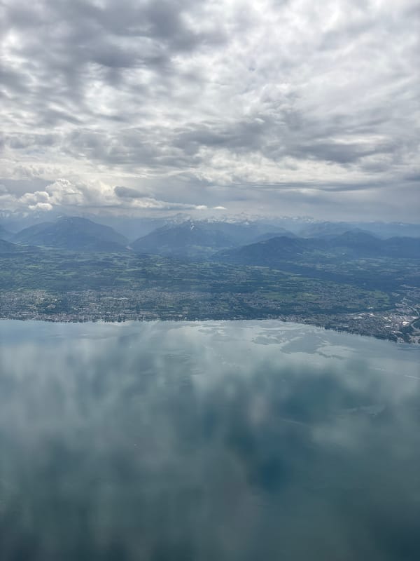 Cloudy landscape view captured over Saint-Sulpice, Switzerland
