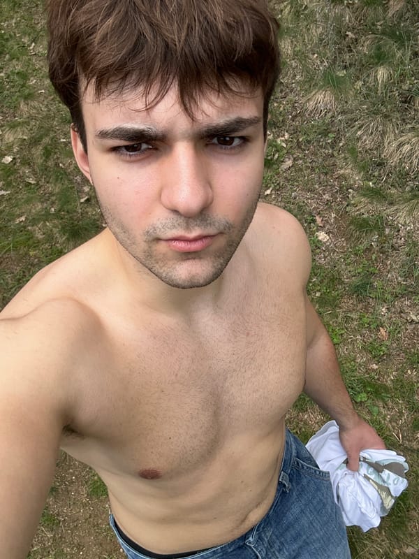 Man photographed outdoors with t-shirt in Luliak, Bulgaria