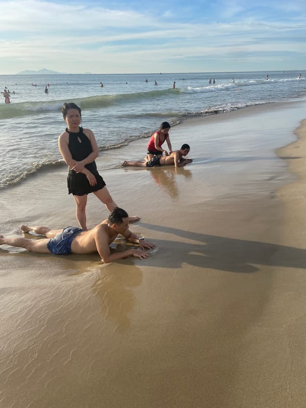 My Khe Beach buzzing with activity against Da Nang's skyline