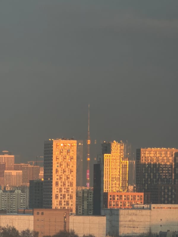 Khimki cityscape captured in water reflections during evening hours