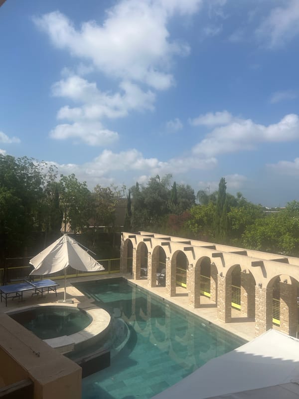 Poolside and street views from a coastal Israeli property