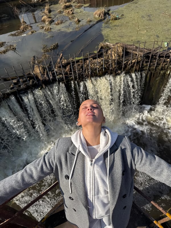 Woman observed at dam edge in Rusalevka, Russia