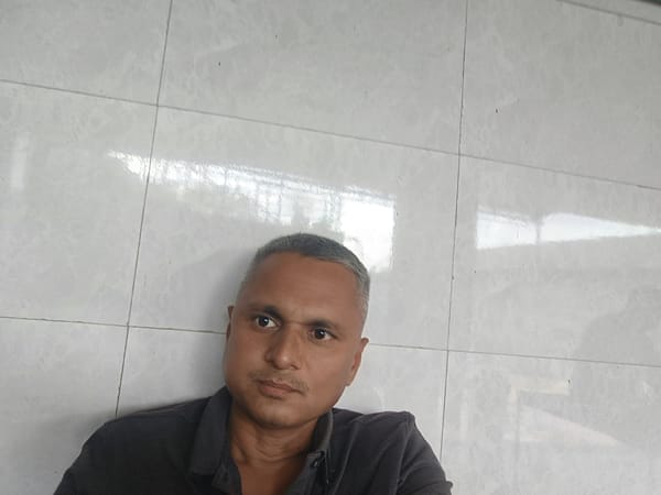 Man photographed indoors in Bagodra, India