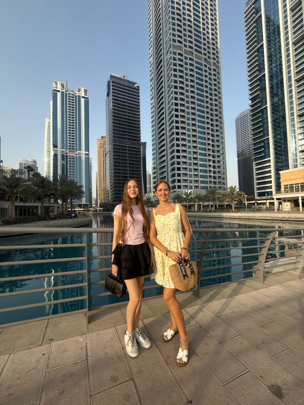 Afternoon stroll along a Dubai waterfront with city views