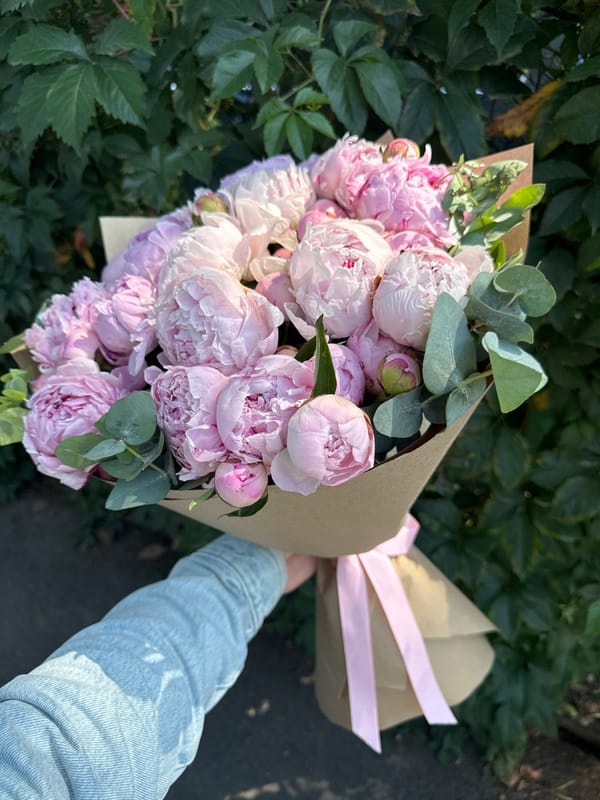 Pink peony bouquet, brown paper wrap, Almaty outdoors