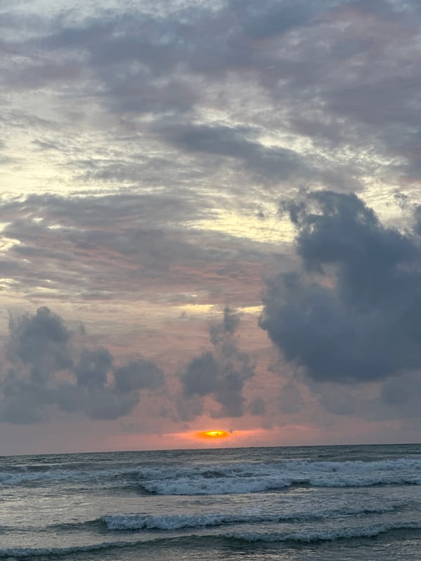 Kamala Beach sunset, sky and surf at golden hour