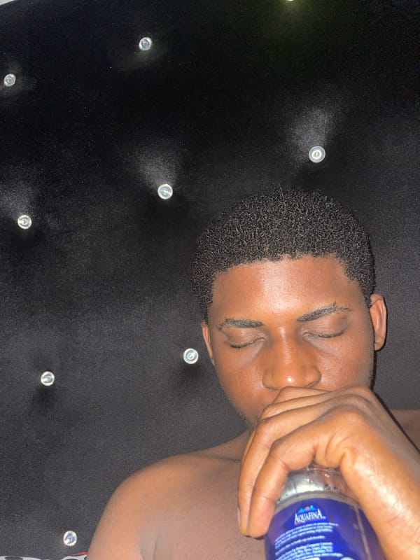 Person receives water treatment in Akwanga, Nigeria