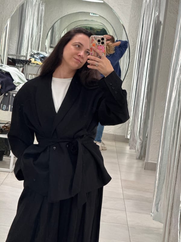 Trying on outfits at a clothing store in Izhevsk