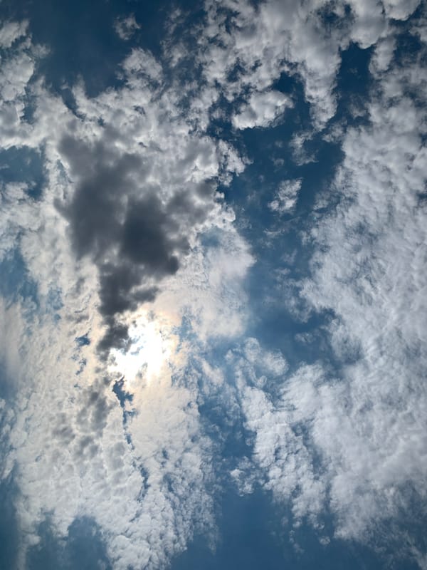 Sun and storm clouds compete over Khazar Raion skies