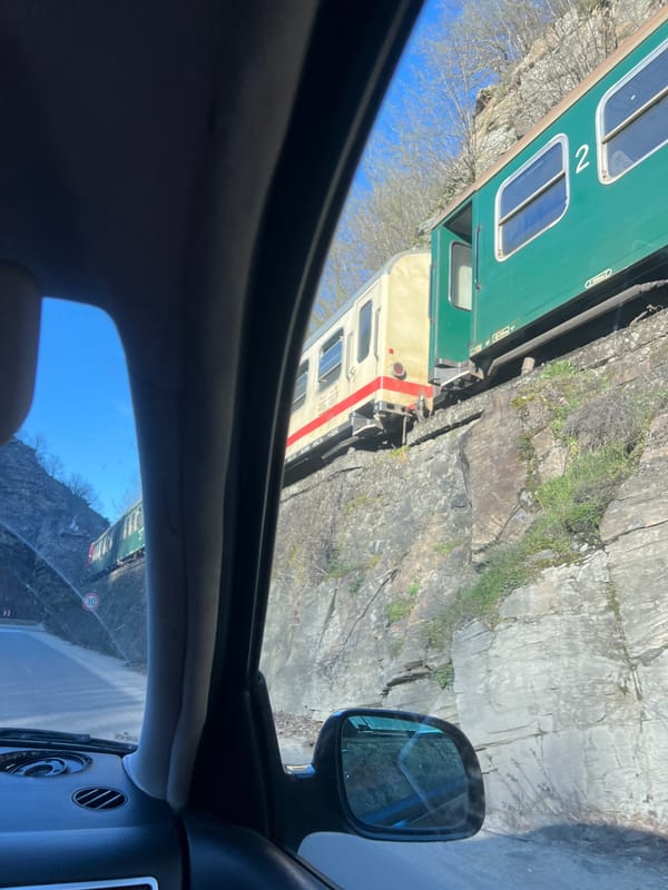 Train spotted running alongside cliff near Dorkovo, Bulgaria