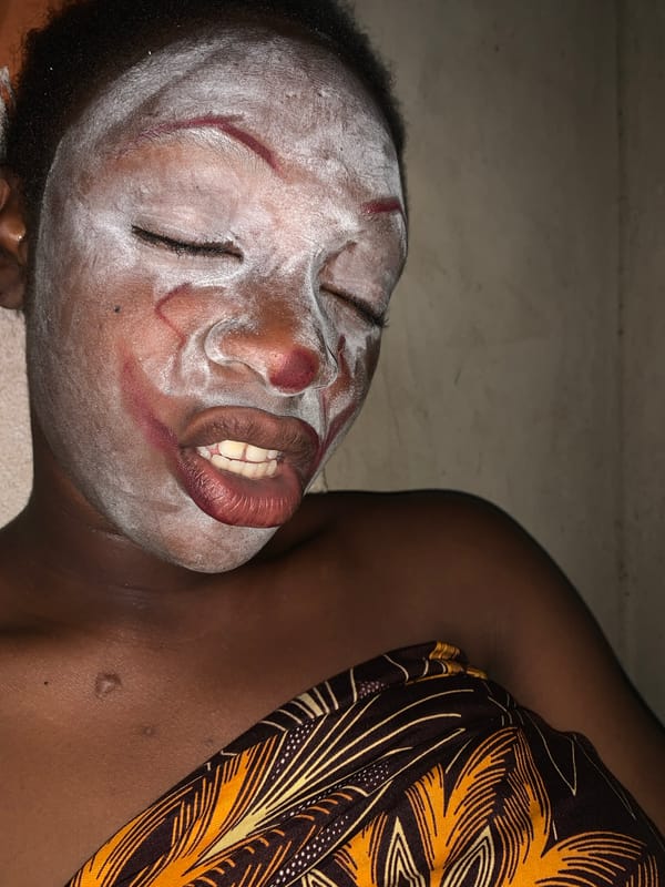 Person observed with traditional face paint in Agban, Nigeria