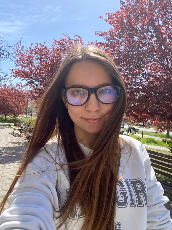 Woman selfie, child at play in Sevastopol park