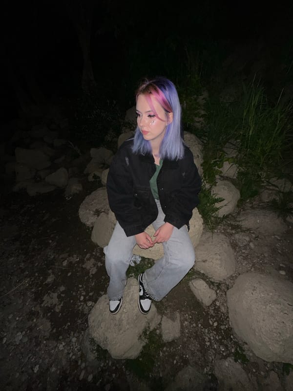 Nighttime photo session captures colorful-haired youth in Zagreb